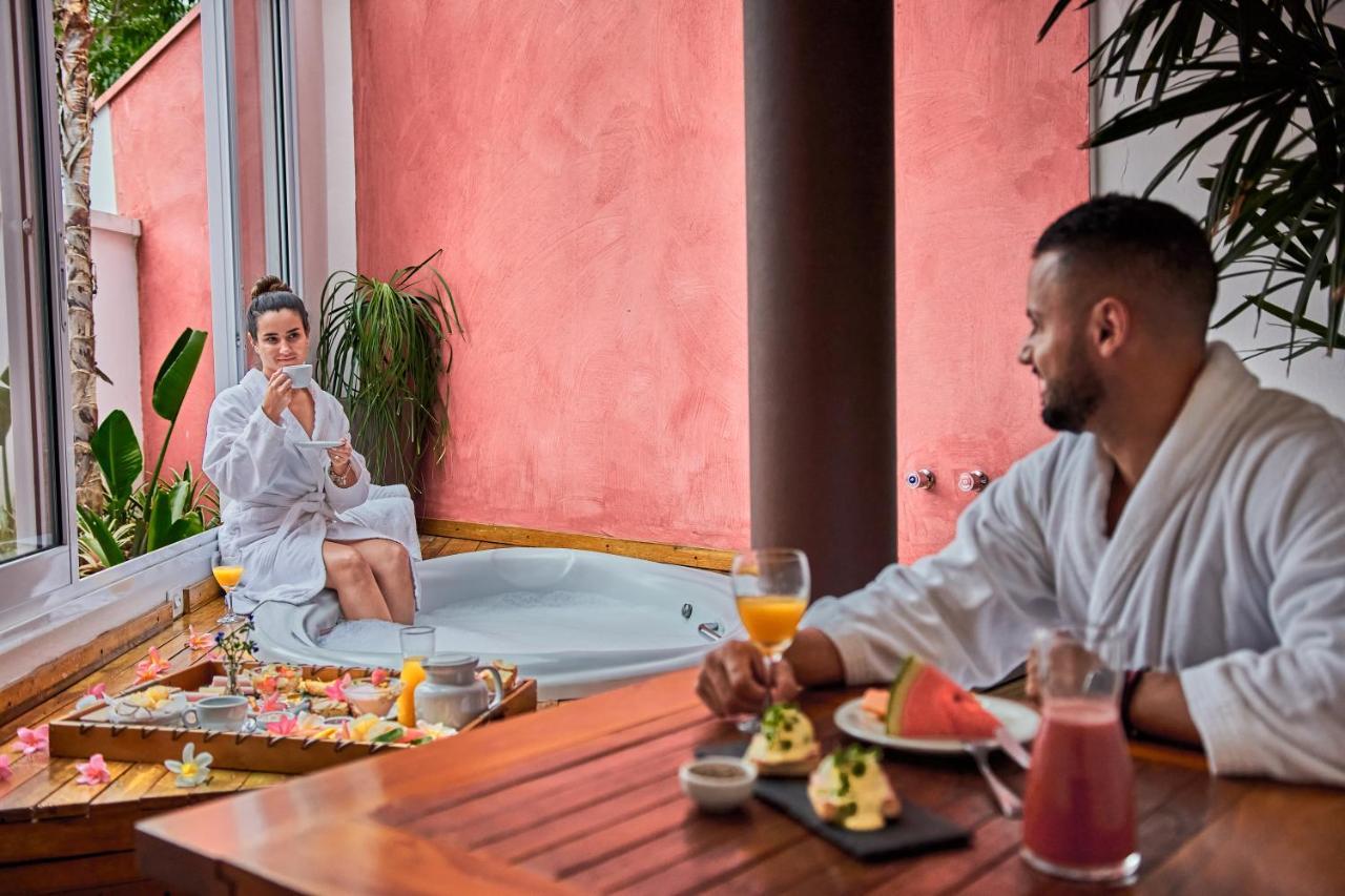 Hotel Boutique Frangipani Brotas Exterior foto Spa at the Hilton Mauritius Resort
