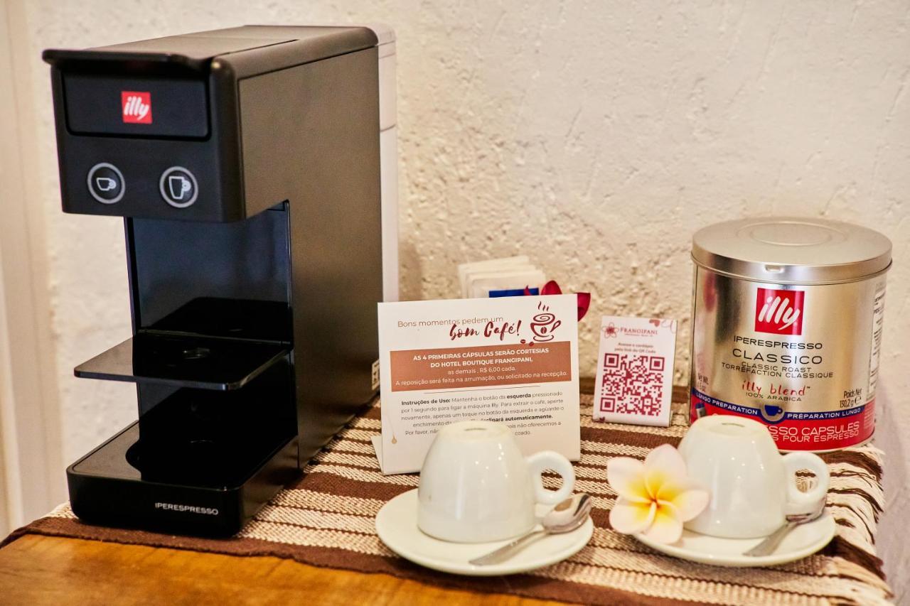 Hotel Boutique Frangipani Brotas Exterior foto A single serve coffee machine